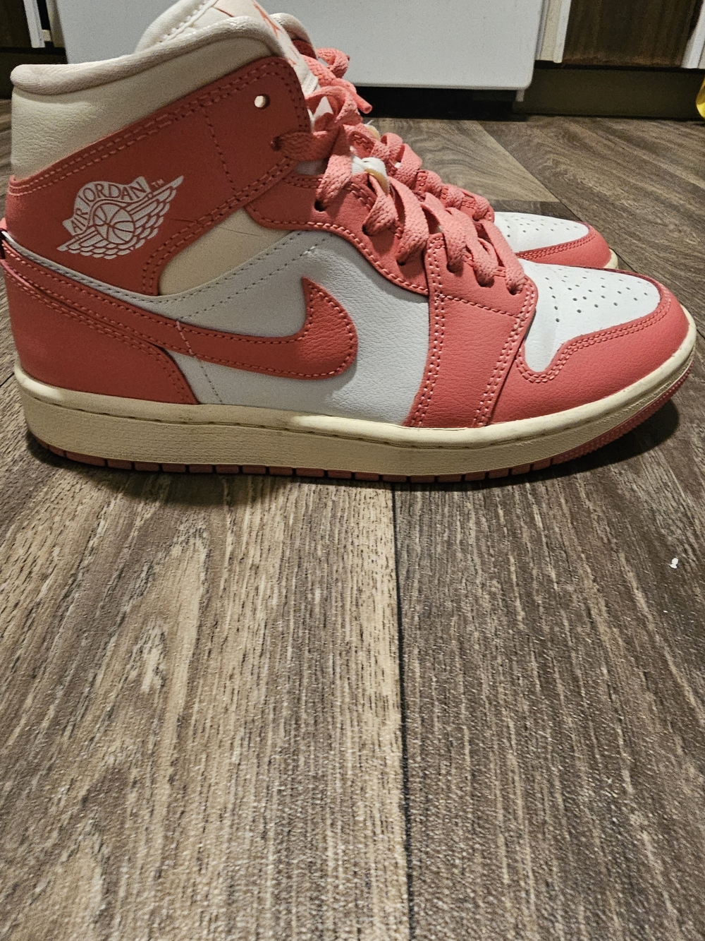 Jordan Women's High-Top Sneakers in Coral and Cream